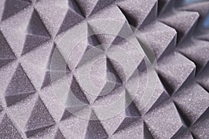 The pattern of the soundproof panel of polyurethane foam. black geometric background