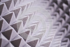 The pattern of the soundproof panel of polyurethane foam. black geometric background