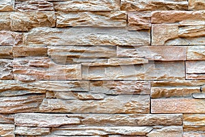 Pattern of stacked stone wall or brick wall texture background