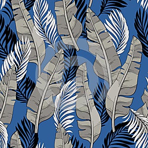 pattern of tropical leaves of palm and banana