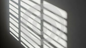 Pattern on a wall created by sunlight streaming through horizontal
