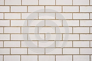 Pattern of white block shape brick wall background texture