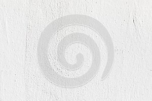 pattern of white painted structured plaster wall