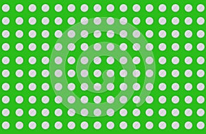 Pattern of white round pills on green background, top view, flat lay