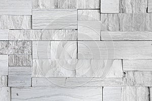 Pattern of the white stone wall texture background