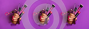 Pattern of woman hands with professional cosmetic tools for make up: brushes, mascara, lipstick, eyelash curler on violet