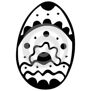 Patterned black and white egg for Easter. Meditative hand drawing for a Christian holiday.