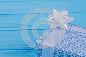 Patterned blue gift box, close up.