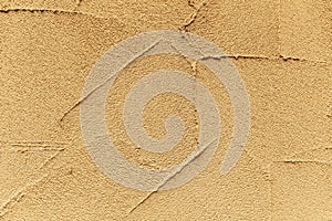 Patterned brown cement wall texture and seamless background