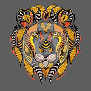 Patterned colored head of the lion. African / indian / totem / tattoo design. It may be used for design of a t-shirt, bag