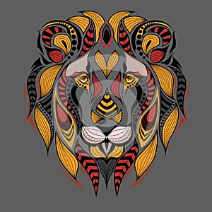Patterned colored head of the lion. African / indian / totem / tattoo design. It may be used for design of a t-shirt, bag, postcar