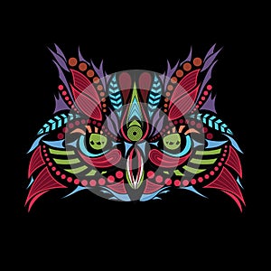 Patterned colored head of the owl on black. African / indian / totem / tattoo design