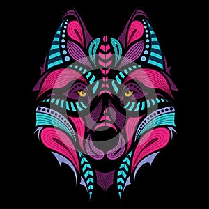 Patterned colored head of the wolf. African / indian / totem / tattoo design