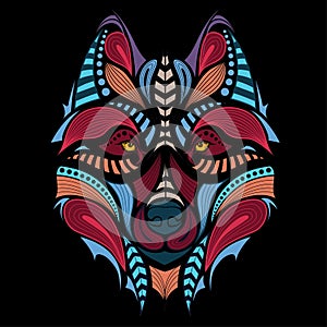 Patterned colored head of the wolf. African / indian / totem / tattoo design