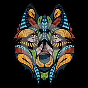 Patterned colored head of the wolf. African / indian / totem / tattoo design