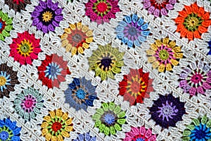 Patterned flower crochet blanket, background.