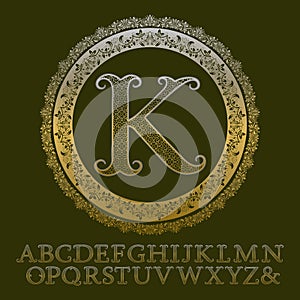 Patterned gold letters with initial monogram. Elegant font