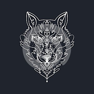 Patterned head of the wolf, animal face on background. African or indian totem, boho style, flash tattoo design