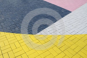 Patterned paving tiles