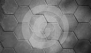 Patterned paving tiles, cement brick floor background black and