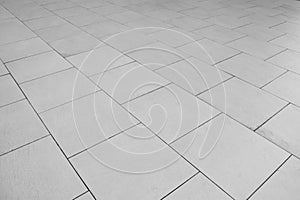 Patterned paving tiles, ceramic brick floor background.
