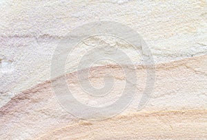 Patterned sandstone texture background.