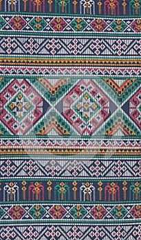 Patterned sarongs sold in the market.