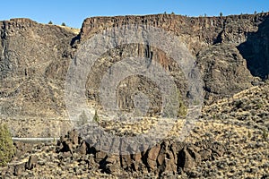 Patterns in the basalt cliffs above the Crooked River at Cove Palisades State Park, Oregon, USA