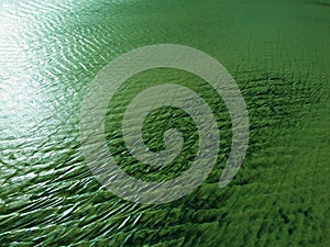 Patterns created ÃÂ¾n the sand by waves and wind, sand pattern as background