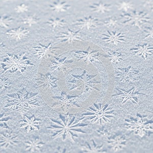 Patterns of intricate snowflakes embossed on a textured white surface. Each