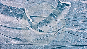 Patterns on the surface of ice and snow, winter concept
