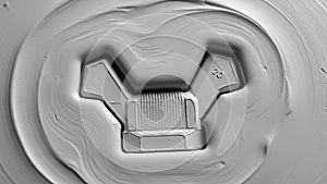 Patterns surround the central design, indicating the precision and complexity