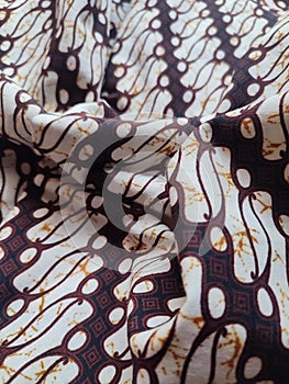 The patterns on traditional Batik cloth provide a visual and philosophical look