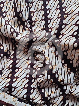 The patterns on traditional Batik cloth provide a visual and philosophical look