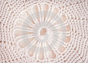 Patterns of white or light brown crochet knitted texture in flowers patterns for background , crafts