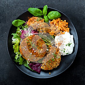 Patties on lettuce with bulgur photo