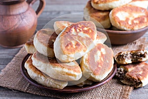 Patties with potatoes and meat. Traditional Russian food.