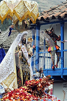 PAUCARTAMBO PERU demons and devils called SAGRAS climbed to the balconies of the town trying to tempt the Virgin of Carmen with photo