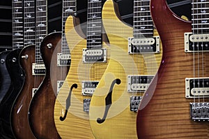 Paul Reed Smith Guitar display. PRS Guitars manufactures a wide array of guitars, bass guitars and amplifiers