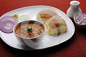 Pav Bhaji Indian spicy fast food with bread, onion and butter, Indian food, Indian Fast food