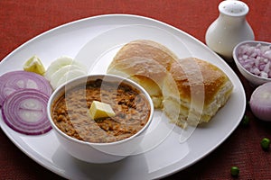 Pav Bhaji Indian spicy fast food with bread, onion and butter, Indian food, Indian Fast food