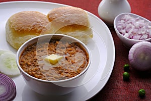 Pav Bhaji Indian spicy fast food with bread, onion and butter, Indian food, Indian Fast food