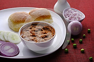 Pav Bhaji Indian spicy fast food with bread, onion and butter, Indian food, Indian Fast food