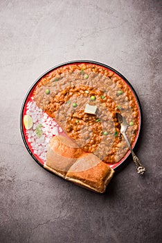 Pav bhaji is a popular Indian street food that consists of a spicy mix vegetable mash & soft buns