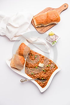 Pav bhaji is a popular Indian street food that consists of a spicy mix vegetable mash & soft buns