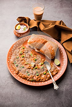 Pav bhaji is a popular Indian street food that consists of a spicy mix vegetable mash & soft buns