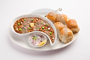 Pav bhaji is a popular Indian street food that consists of a spicy mix vegetable mash & soft buns