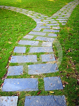 Paved path in greens,vetical