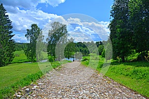 Paved path to pier on Ruza river in Komlevo, Moscow region, Russia photo