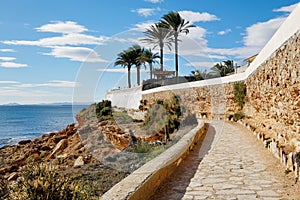 Paved promenade of Cabo Roig. Costa Blanca. photo